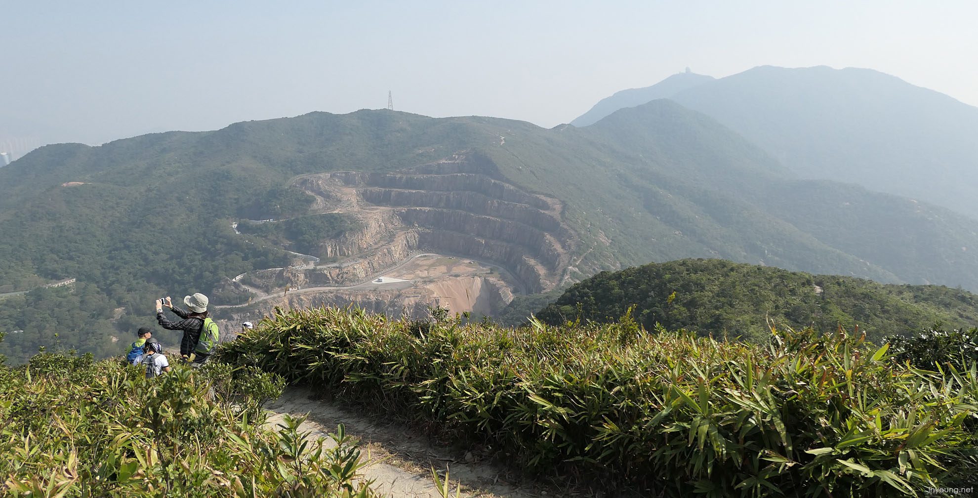 People walking on high rise walking trail