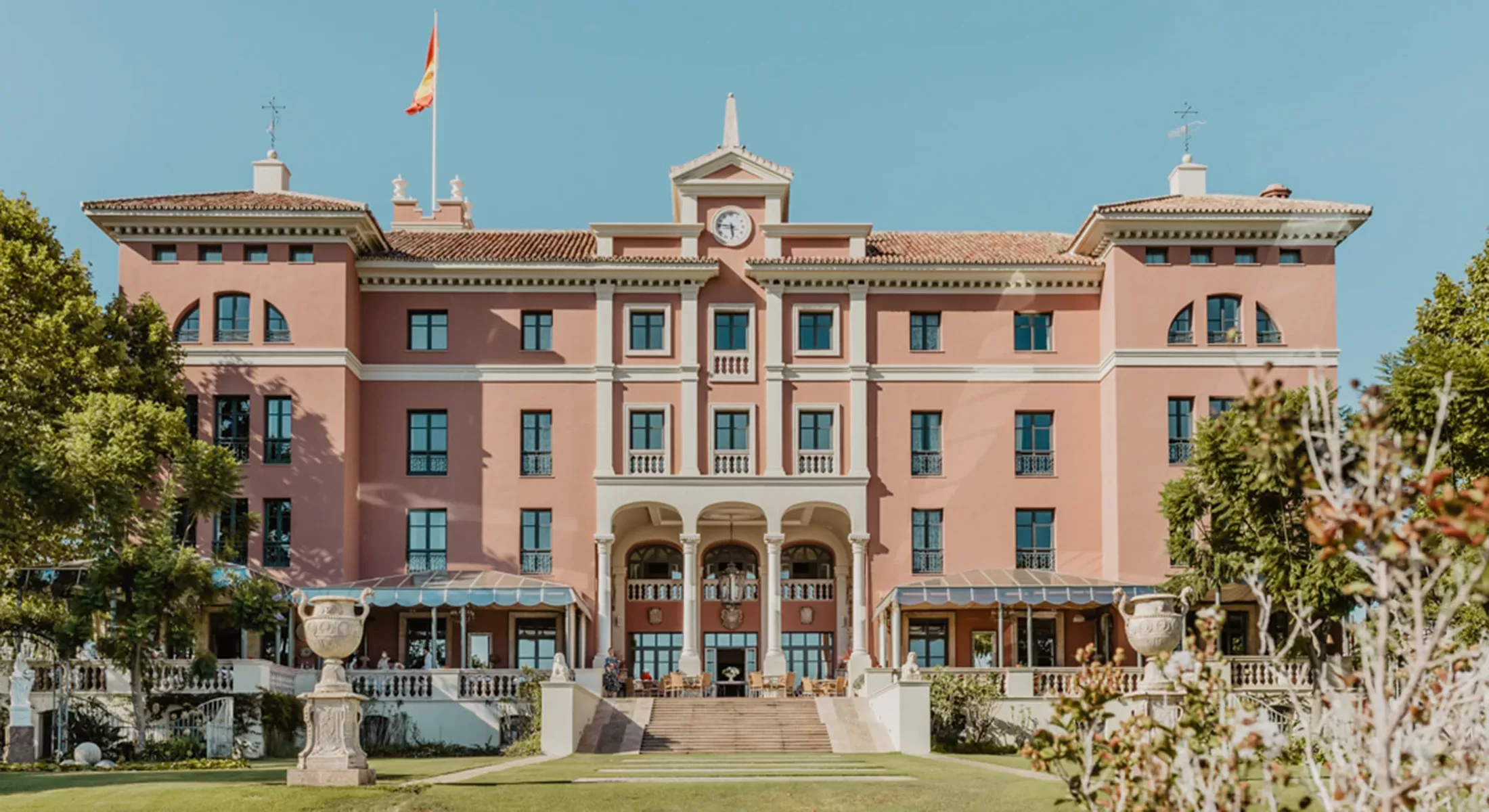 Grad pink exterior of a Palace in Malaga